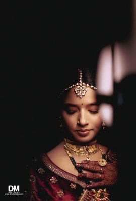 A Woman With Jewelry On Her Head